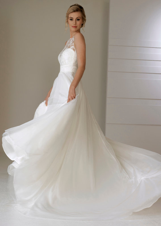 Organza wedding dress with full organza circle skirt and sheer high lace neckline 