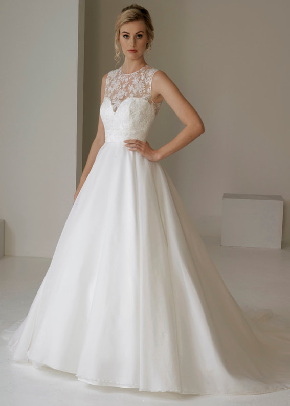 Wedding dress with full skirt, train and high sheer lace neckline