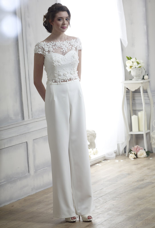 Satin bridal trousers worn with a satin bandeau top an sheer lace bridal shrug