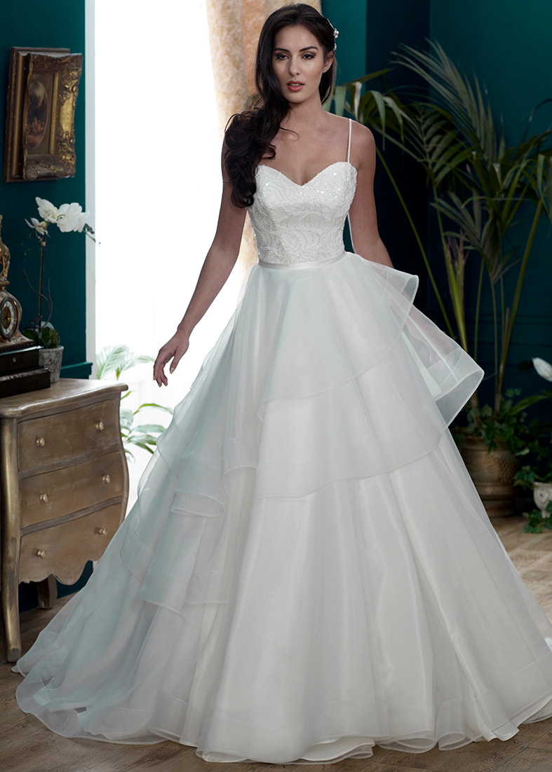 Full skirted wedding dress with a tiered organza skirt detail