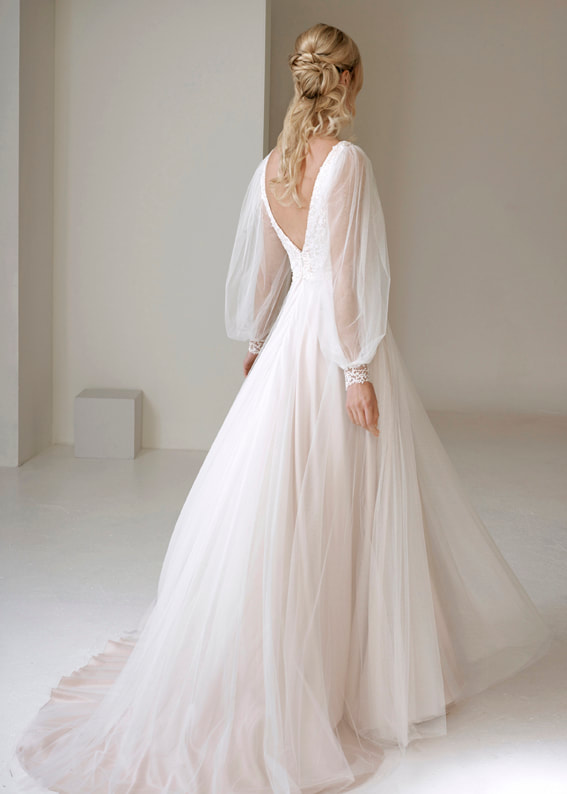 Dreamy wedding dress with detachable sleeves and low v back
