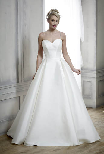 Simple ballgown wedding dress with a box pleated skirt and spaghetti straps