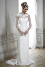 fitted strapless lace wedding dress worn with a sheer bridal cape with lace neckline detail