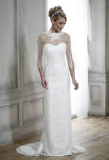 fitted strapless wedding dress worn with a sheer bridal cape