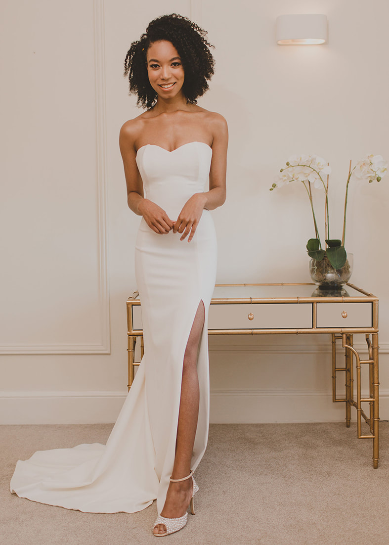 Hepburn Gown. A stunning fitted strapless wedding dress with a thigh split