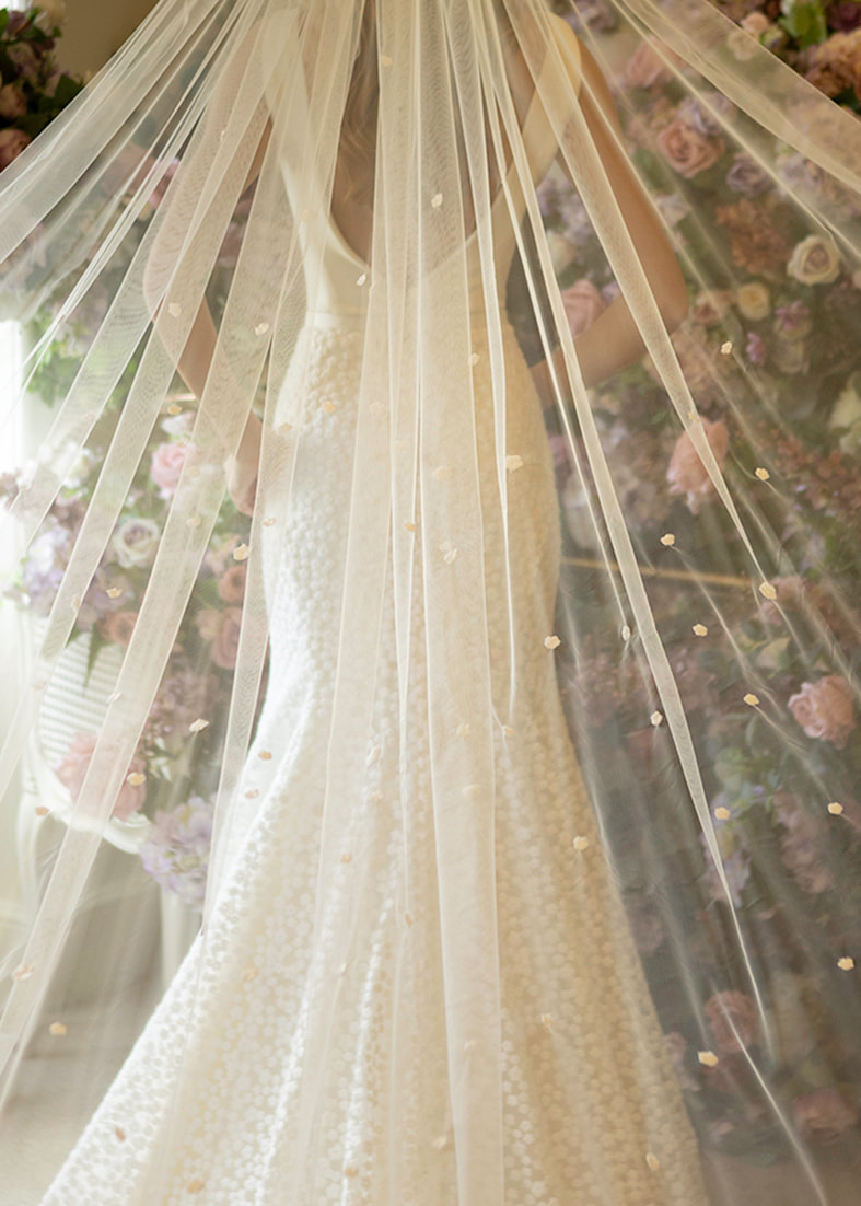 Cathedral length tulle bridal veil with all over embroidered flower detail