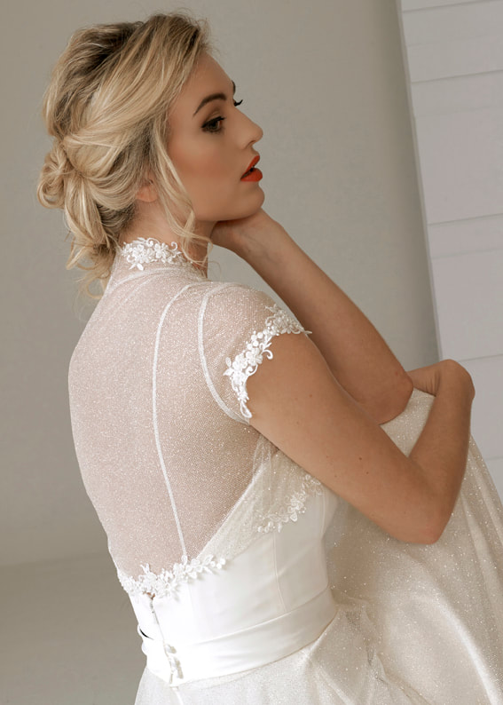 Bridal Shrug in sparkle tulle edged with lace. Back shot