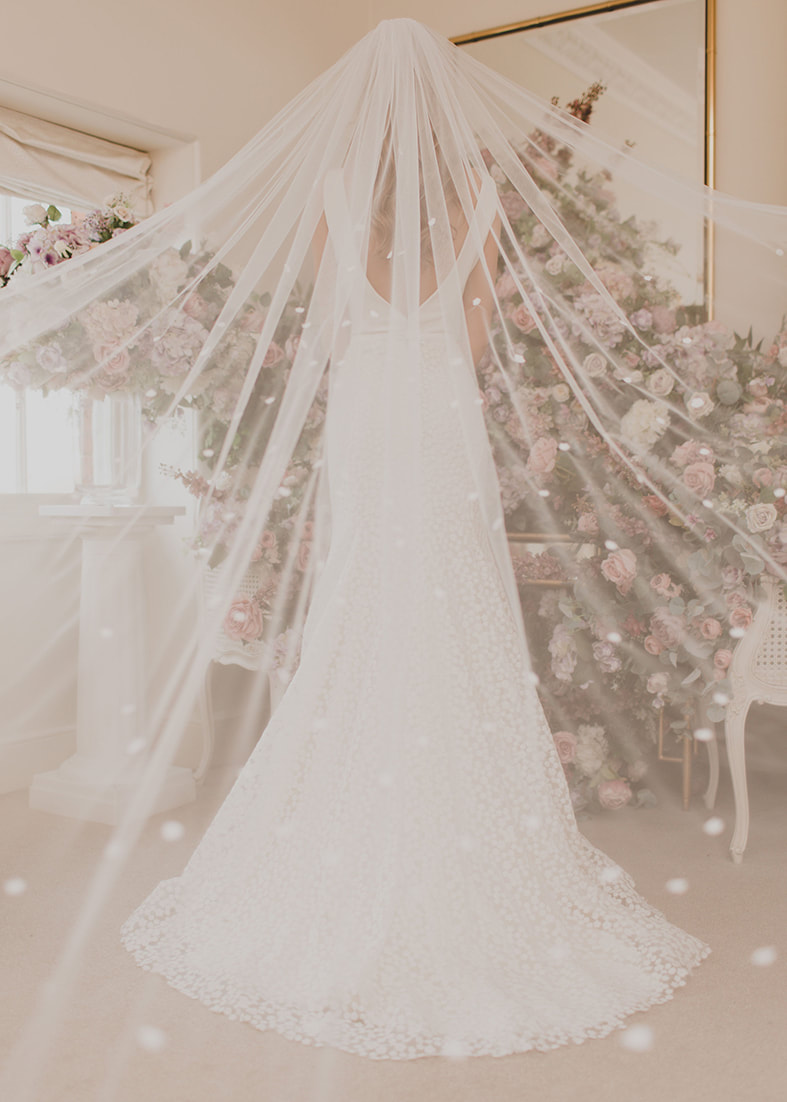 Cathedral length tulle bridal veil with all over embroidered flower detail
