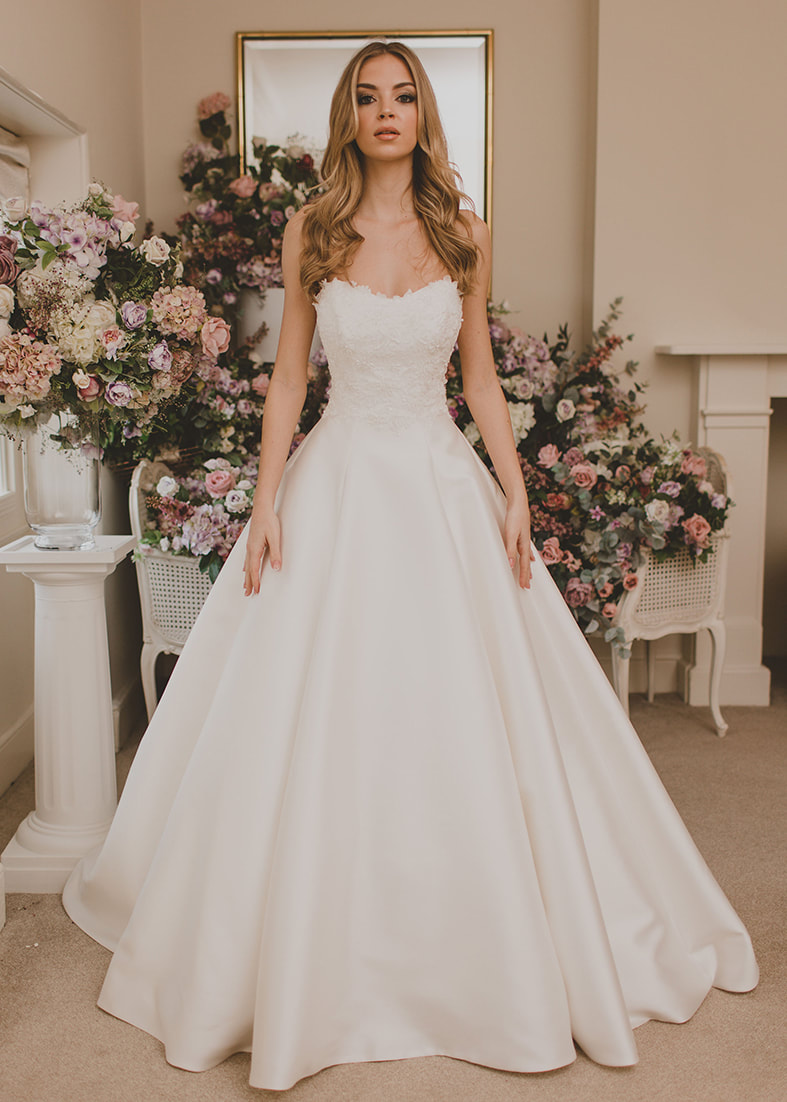 Full skirted strapless wedding gown with a lace embellished bodice & sweetheart neckline