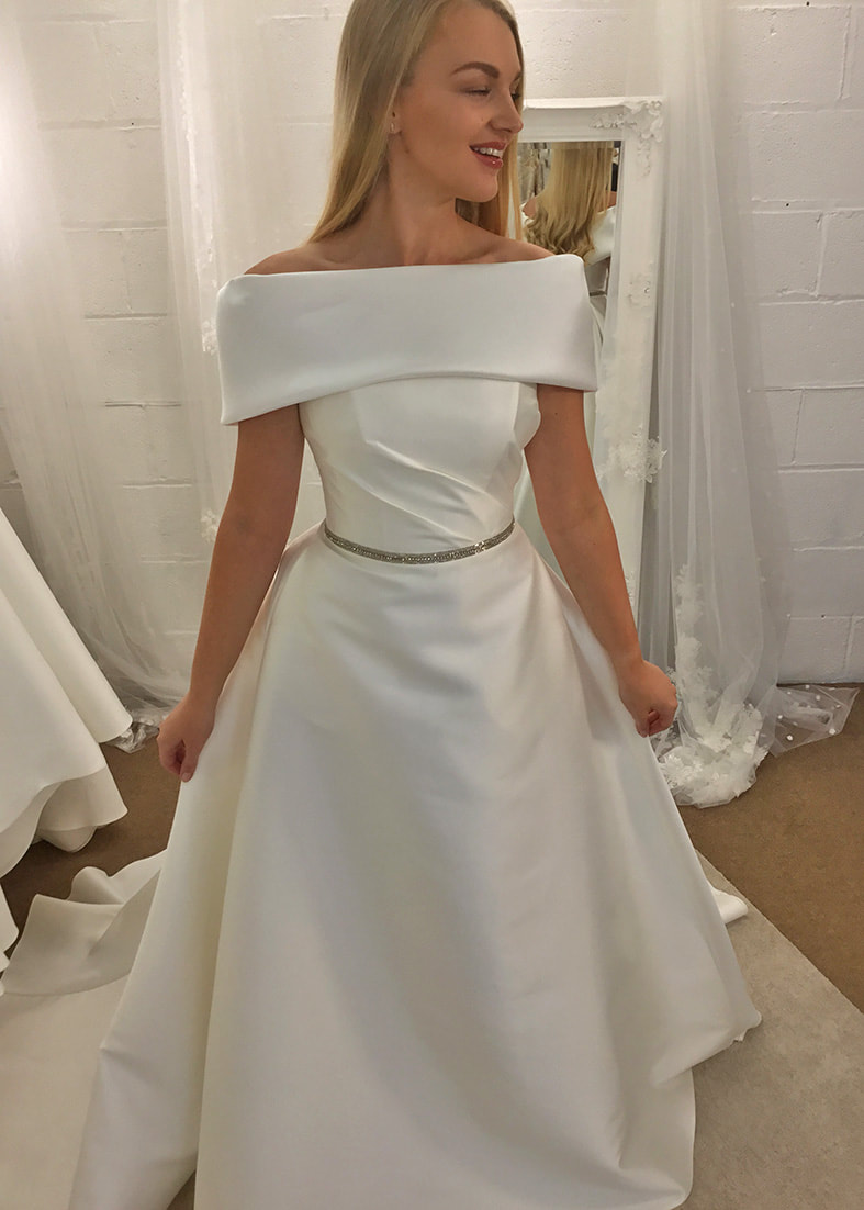 Bardot Collar. A wide off the shoulder collar. This piece is detachable and can be worn with any strapless wedding dress for an elegant modern look