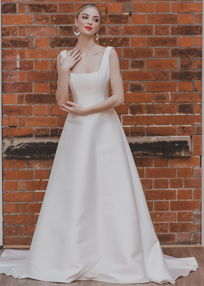 Sentiment - a structured ballgown style wedding gown in Mikado silk with wide straps and a square neckline