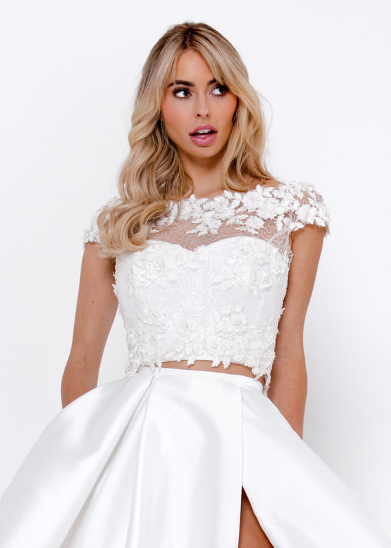 Cap sleeved embroidered tulle shrug with detailed neckline 