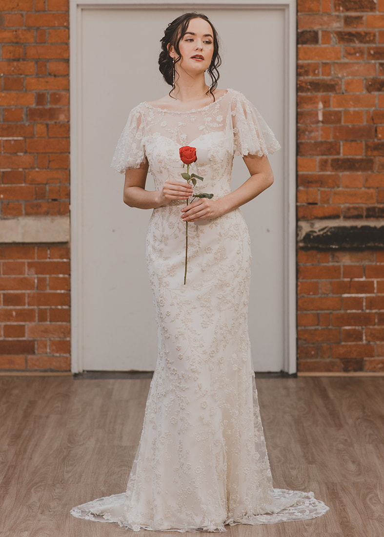 True Love - vintage style wedding dress with a high beaded tulle neckline and flutter sleeve and fitted fishtail silhouette